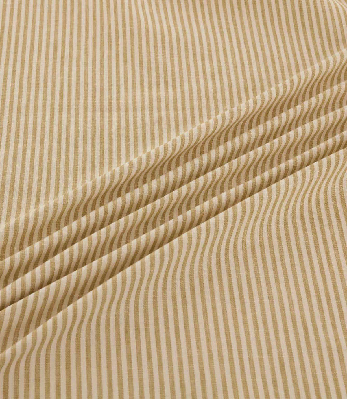 Shoreham Sandytan striped fabric arranged in soft diagonal folds, showcasing its warm sandy beige and cream ticking stripes, textured woven finish and natural drape.