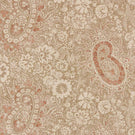 Southold Coralee paisley floral fabric featuring intricate coral pink paisley motifs, cream flowers and delicate botanical foliage on a natural beige background with a subtle woven texture.