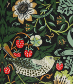 Close-up of decorative bird and strawberry print fabric with intricate botanical detailing on black background.