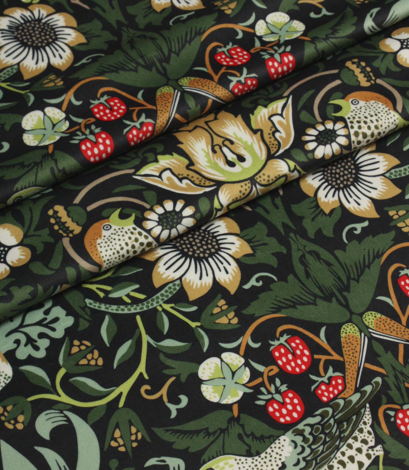 Folded botanical fabric with stylised flowers, birds and strawberries in rich green and cream colours.