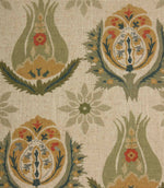 Close-up of decorative botanical fabric featuring stylised floral medallions and tulip-inspired motifs in earthy green and gold shades.