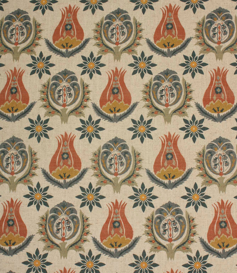 Linen-look fabric with repeating Arts and Crafts inspired floral motifs in terracotta, ochre and deep blue tones on a natural background.