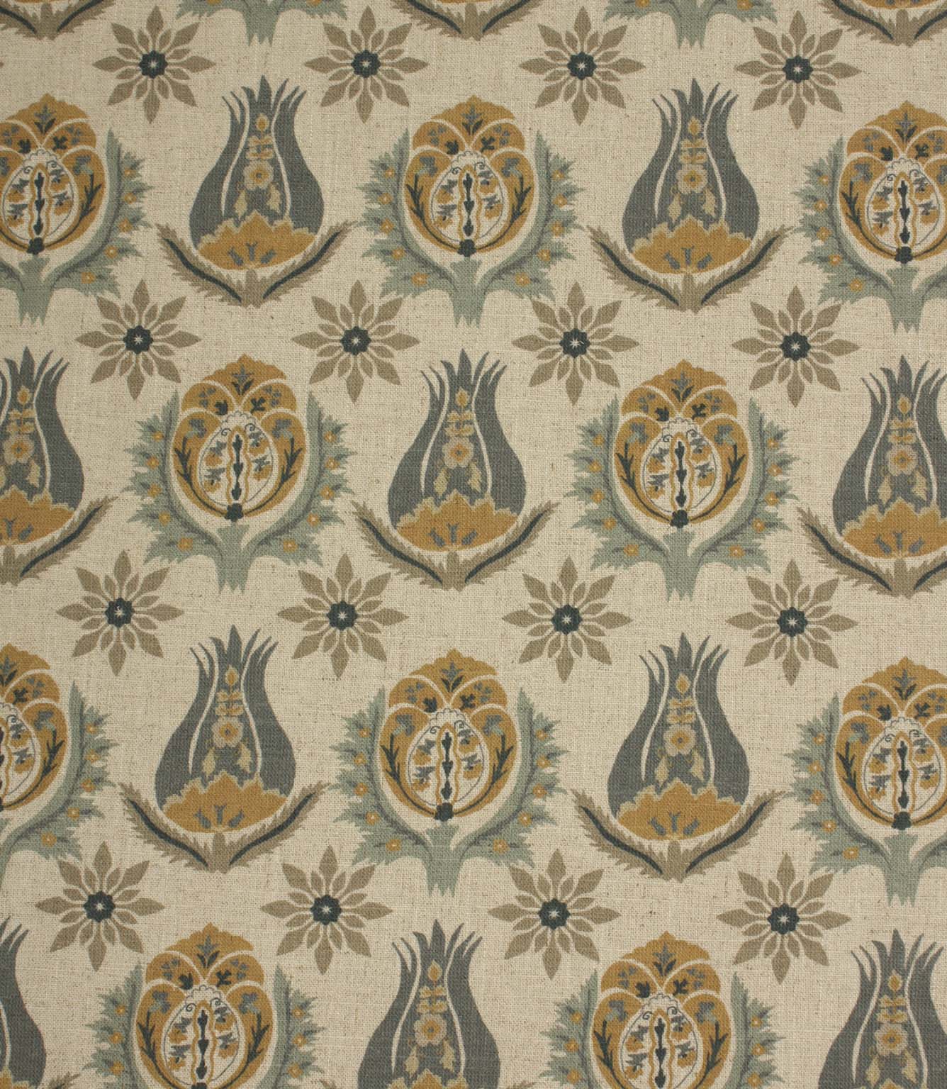 Linen-look fabric with repeating botanical motifs in muted blue, ochre and taupe tones on a natural background.