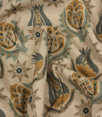 Draped botanical print fabric with stylised floral motifs in soft blue, mustard and natural linen shades.