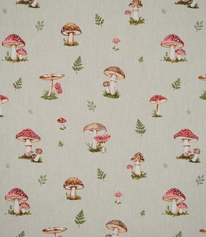 Toadstool Meadow Multi fabric featuring a repeating small-scale woodland print of red and brown mushrooms, spotted toadstools and delicate green fern sprigs on a natural beige woven background.