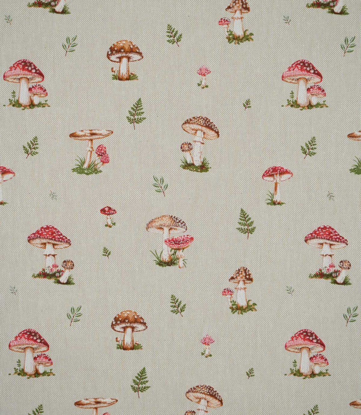 Toadstool Meadow Multi fabric featuring a repeating small-scale woodland print of red and brown mushrooms, spotted toadstools and delicate green fern sprigs on a natural beige woven background.