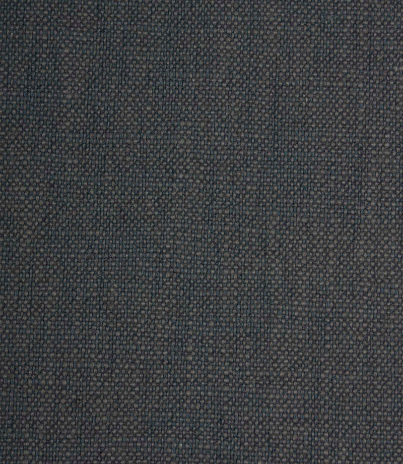 Trento woven plain fabric in indigo, showcasing the textured weave and subtle tonal variation across the fabric surface.