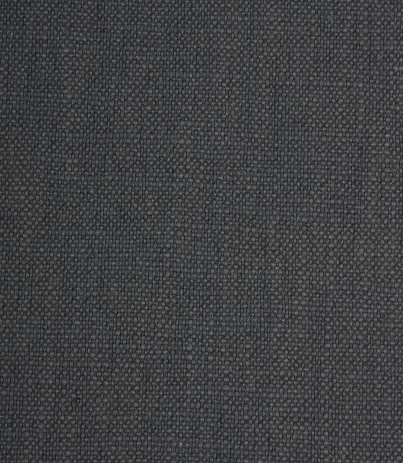 Trento woven plain fabric in indigo, showcasing the textured weave and subtle tonal variation across the fabric surface.