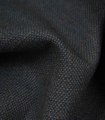 Detailed close-up of Trento plain woven fabric in indigo, featuring the tactile weave and elegant textured finish.