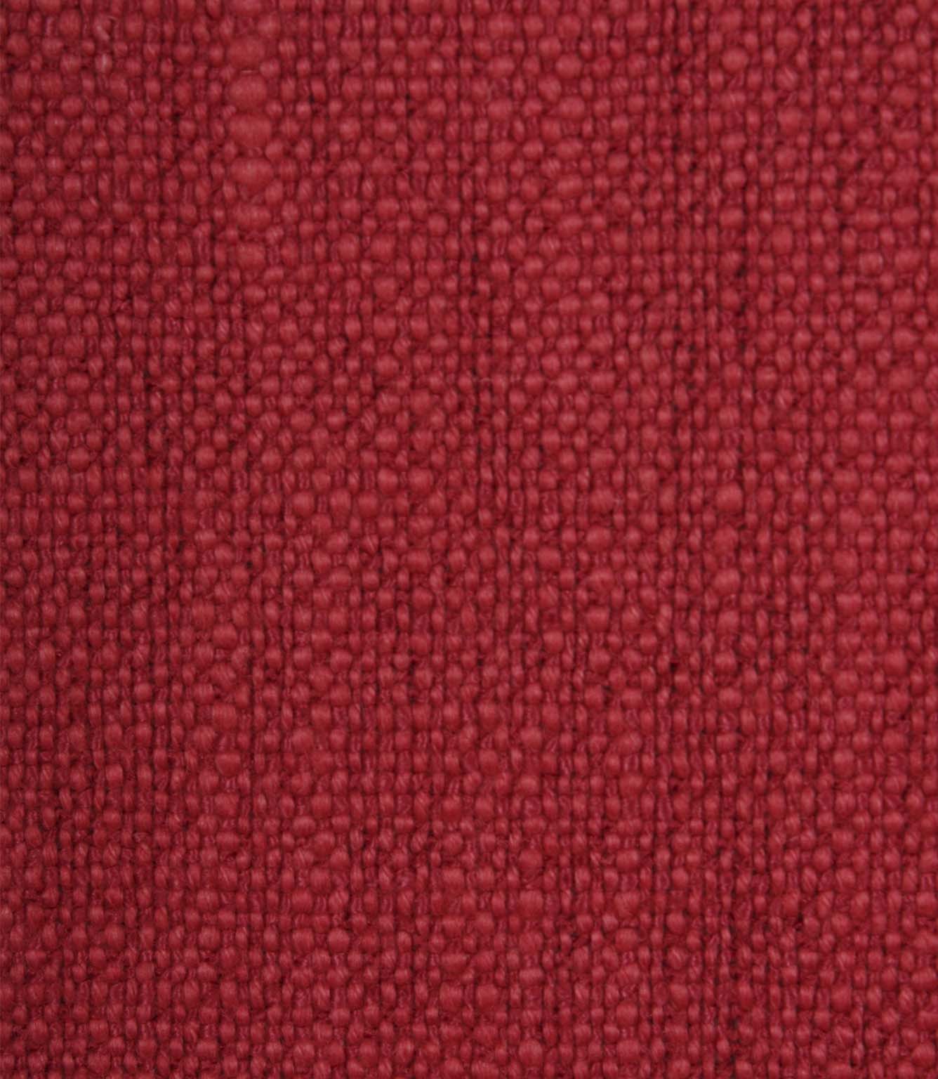 Close-up detail of Trento woven plain fabric in peony, highlighting the rich texture and durable woven construction.