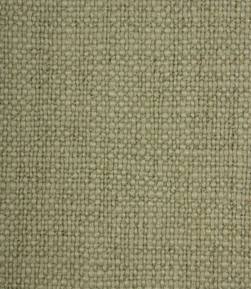 Close-up detail of Trento woven plain fabric in sage, highlighting the rich texture and characterful woven construction.