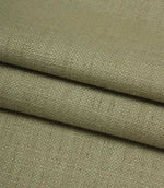 Folded Trento woven plain fabric in sage, displaying the fabric's texture, weight and natural woven finish.