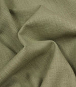 Trento woven fabric in sage draped in soft folds, illustrating its relaxed texture and suitability for curtains, blinds and cushions.
