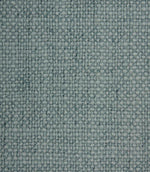 Close-up detail of Trento woven plain fabric in sky, highlighting the rich texture and characterful woven construction.
