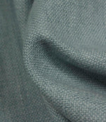 Detailed close-up of Trento plain woven fabric in sky, featuring the tactile weave and softly textured appearance.