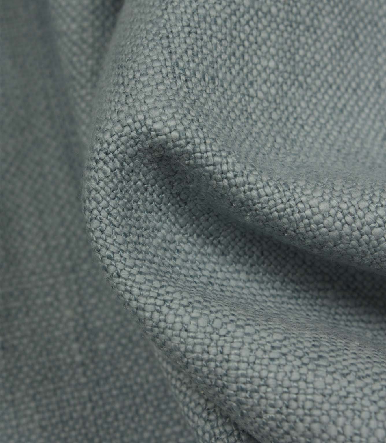 Detailed close-up of Trento plain woven fabric in sky, featuring the tactile weave and softly textured appearance.