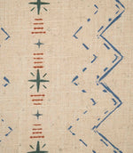 Close-up of Twilight Mill Blue Chestnut fabric showing the hand-drawn geometric motif with stitched zigzags and decorative star details.