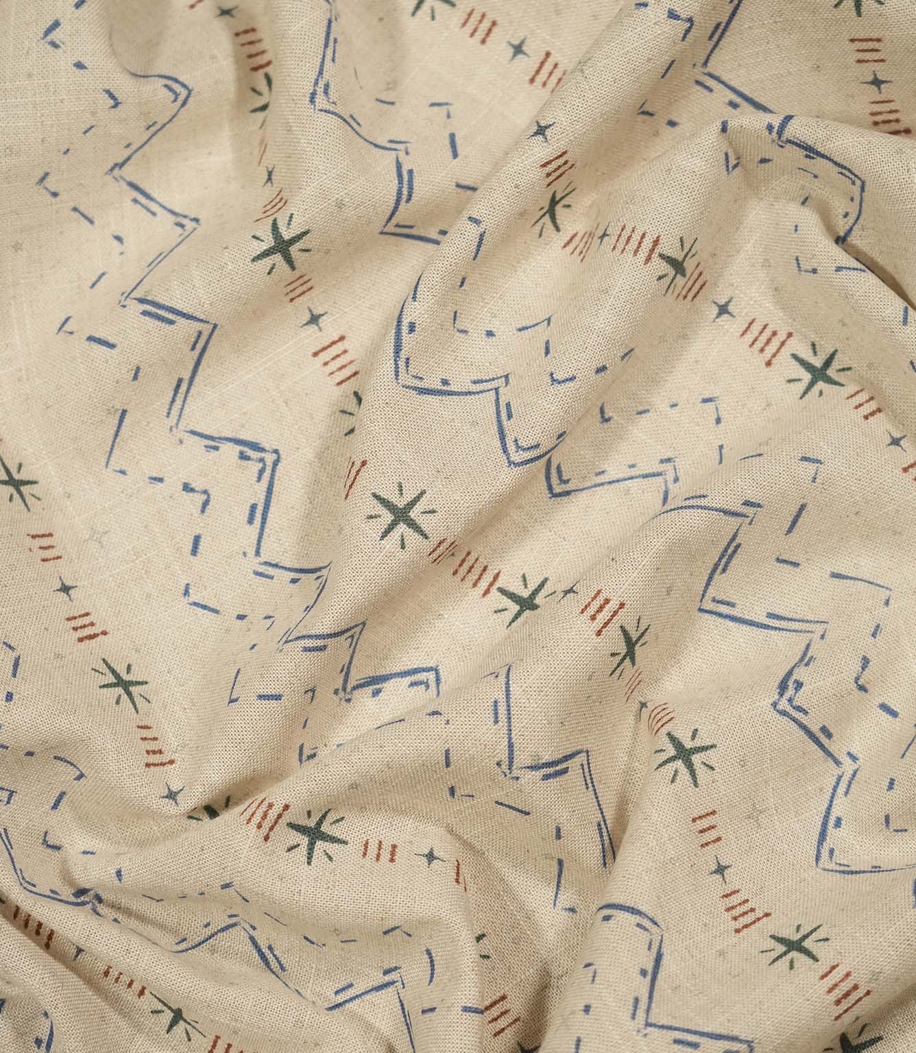 Twilight Mill Blue Chestnut fabric draped to demonstrate its soft handle and decorative small-scale geometric print.