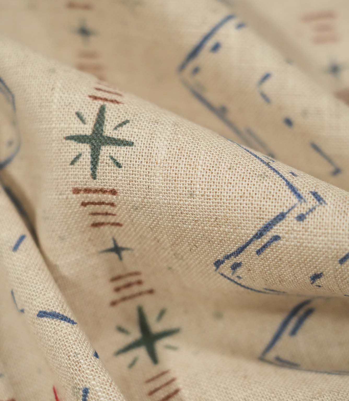 Macro close-up of Twilight Mill Blue Chestnut fabric highlighting the woven texture and hand-drawn geometric design.