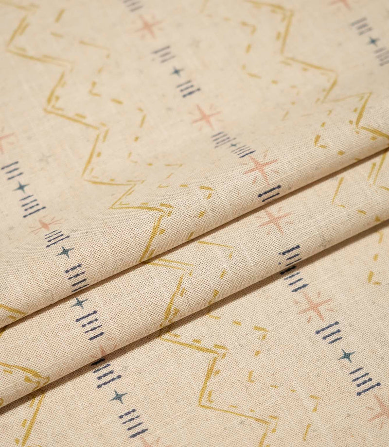 Layered Twilight Mill Gold fabric displaying the repeating contemporary geometric design and natural woven texture.
