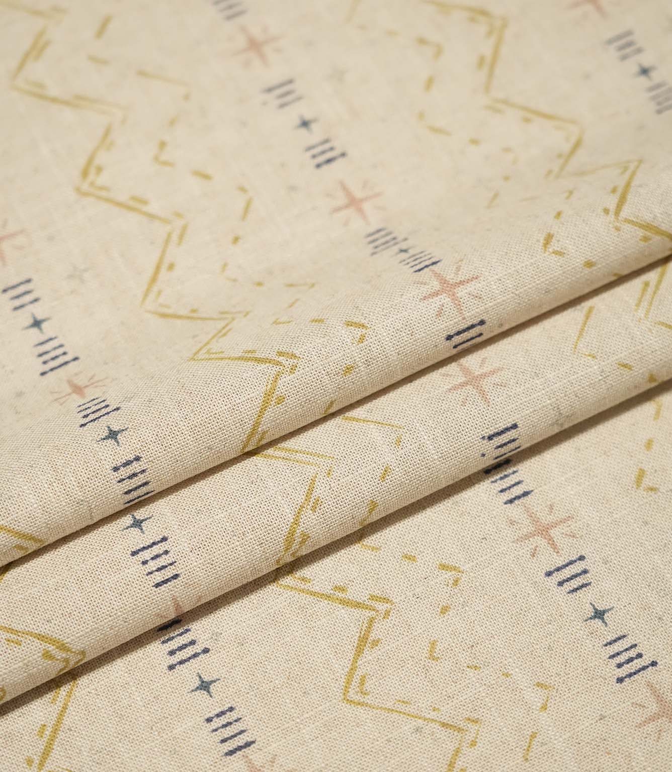 Layered Twilight Mill Gold fabric displaying the repeating contemporary geometric design and natural woven texture.