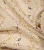 Macro close-up of Twilight Mill Gold fabric highlighting the woven texture and hand-drawn geometric design.