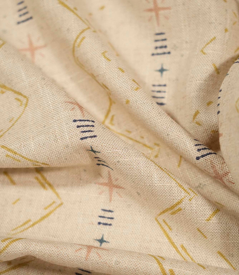 Macro close-up of Twilight Mill Gold fabric highlighting the woven texture and hand-drawn geometric design.