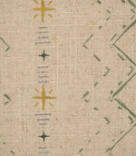 Close-up of Twilight Mill Green Apple Gold fabric showing the hand-drawn geometric motif with green zigzags, gold stars and fine blue stripe details.