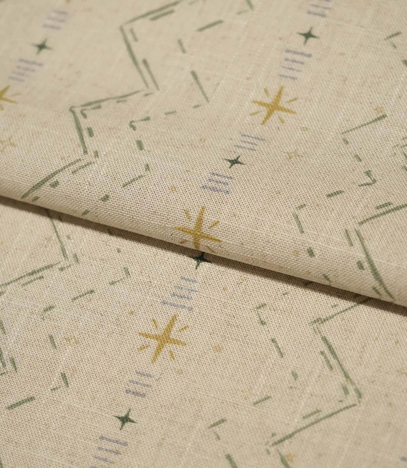 Folded Twilight Mill Green Apple Gold fabric showcasing the textured woven finish and small-scale geometric pattern.
