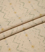 Layered Twilight Mill Green Apple Gold fabric displaying the repeating contemporary geometric design and natural woven texture.
