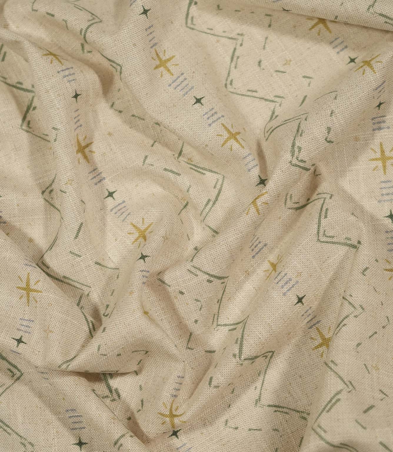 Twilight Mill Green Apple Gold fabric draped to demonstrate its soft handle and decorative small-scale geometric print.