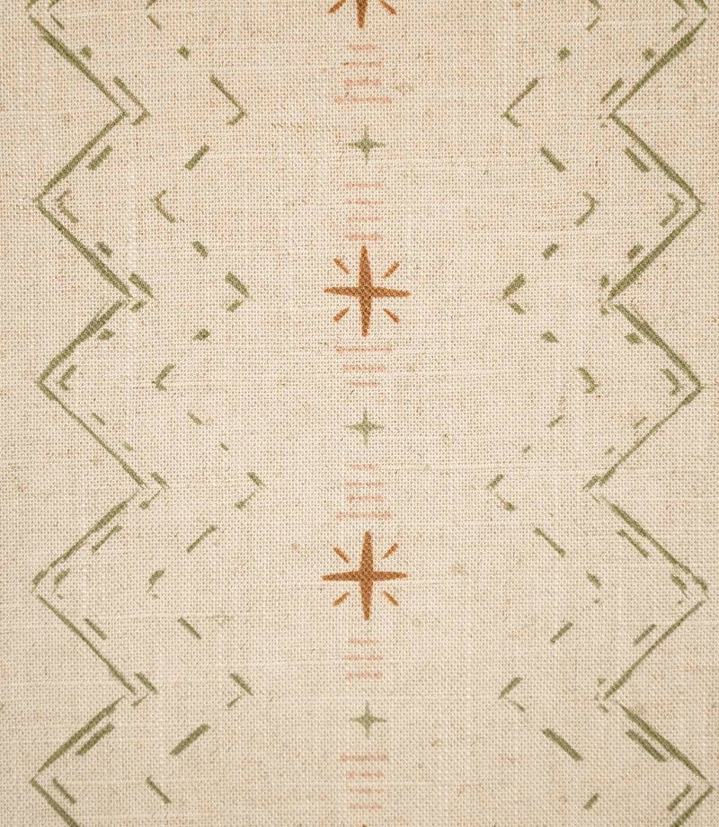 Close-up of Twilight Mill Olive Green Hazelnut fabric showing the hand-drawn geometric motif with olive green zigzags, hazelnut stars and fine blush stripe details.