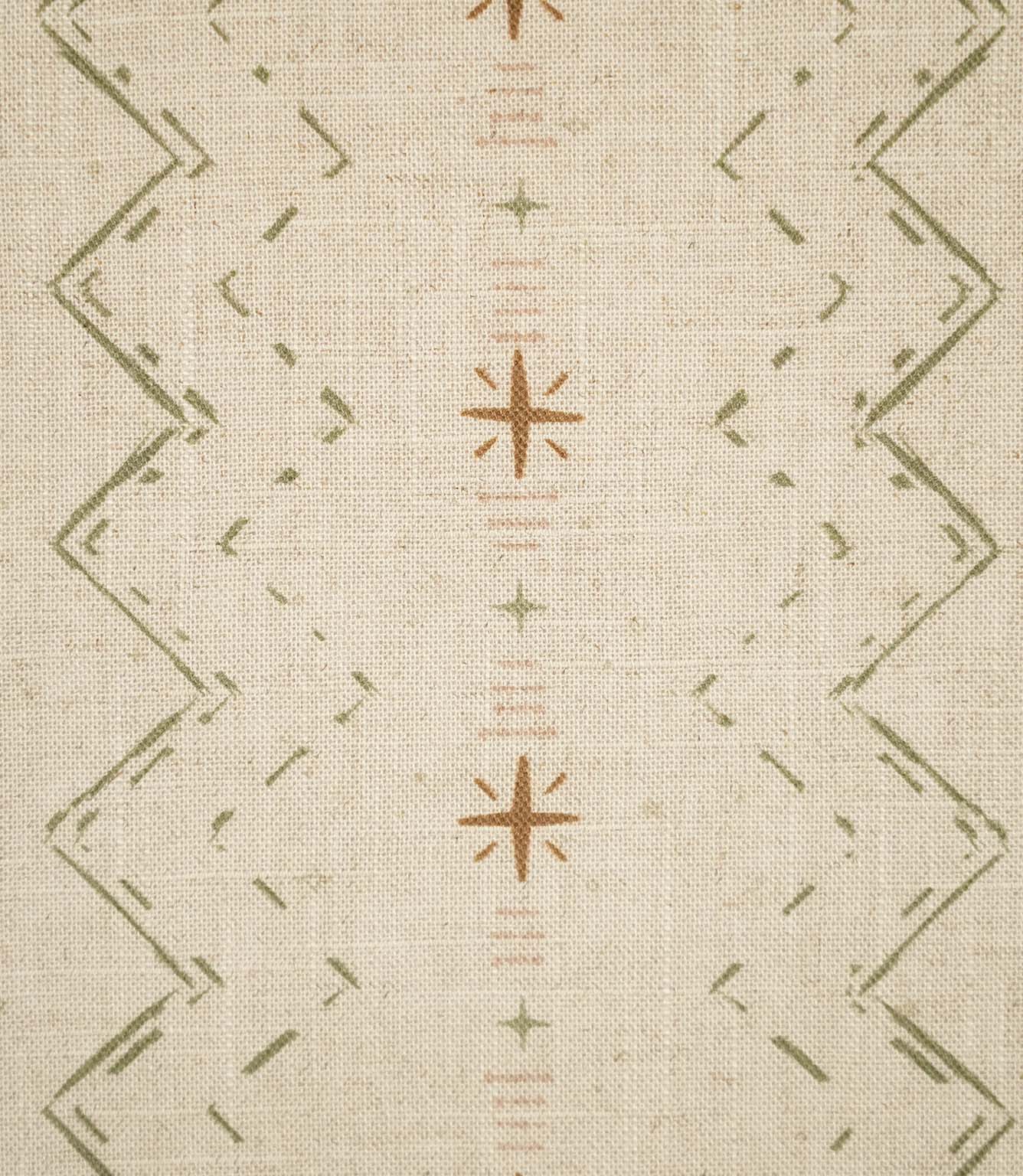 Close-up of Twilight Mill Olive Green Hazelnut fabric showing the hand-drawn geometric motif with olive green zigzags, hazelnut stars and fine blush stripe details.
