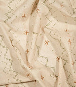 Twilight Mill Olive Green Hazelnut fabric draped to demonstrate its soft handle and decorative small-scale geometric print.