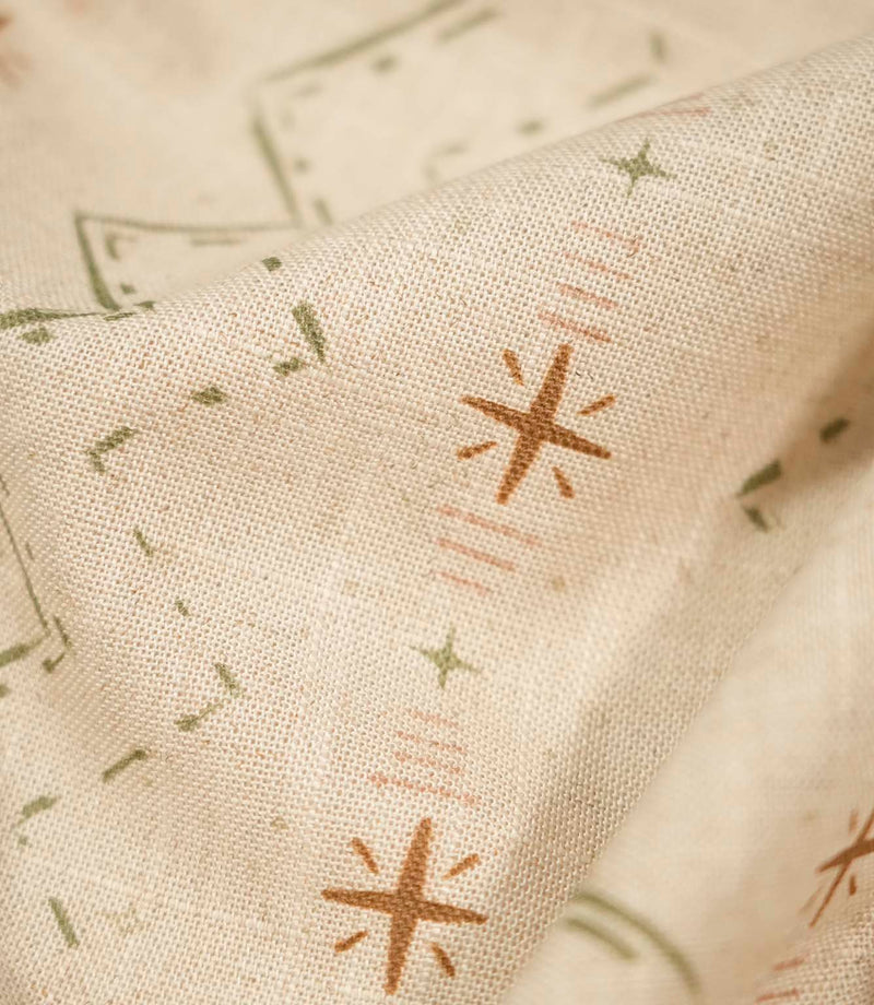 Macro close-up of Twilight Mill Olive Green Hazelnut fabric highlighting the woven texture and hand-drawn geometric design.