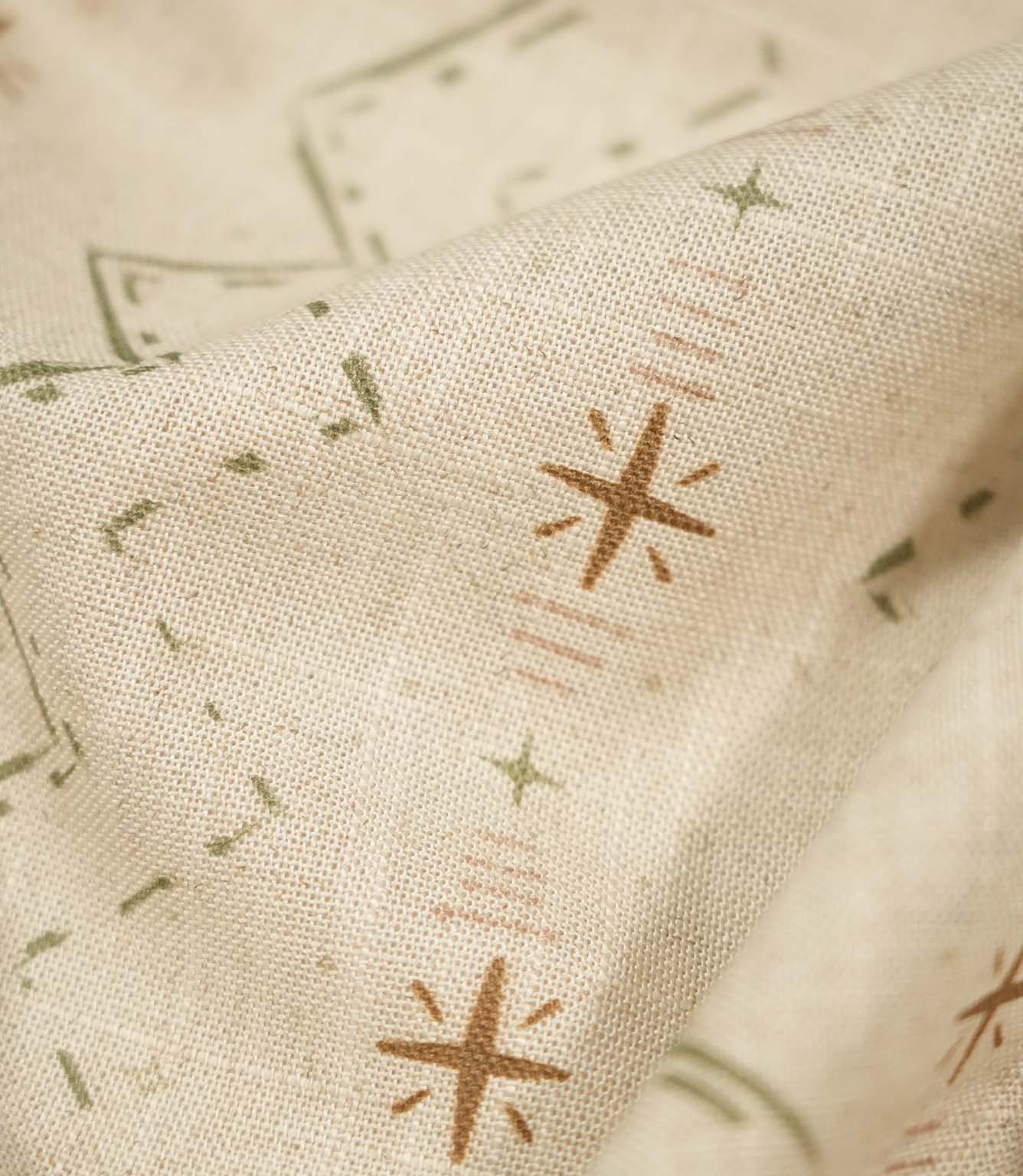 Macro close-up of Twilight Mill Olive Green Hazelnut fabric highlighting the woven texture and hand-drawn geometric design.