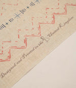 Twilight Mill Red Steel Blue fabric showing the printed geometric design alongside the branded fabric selvedge edge.
