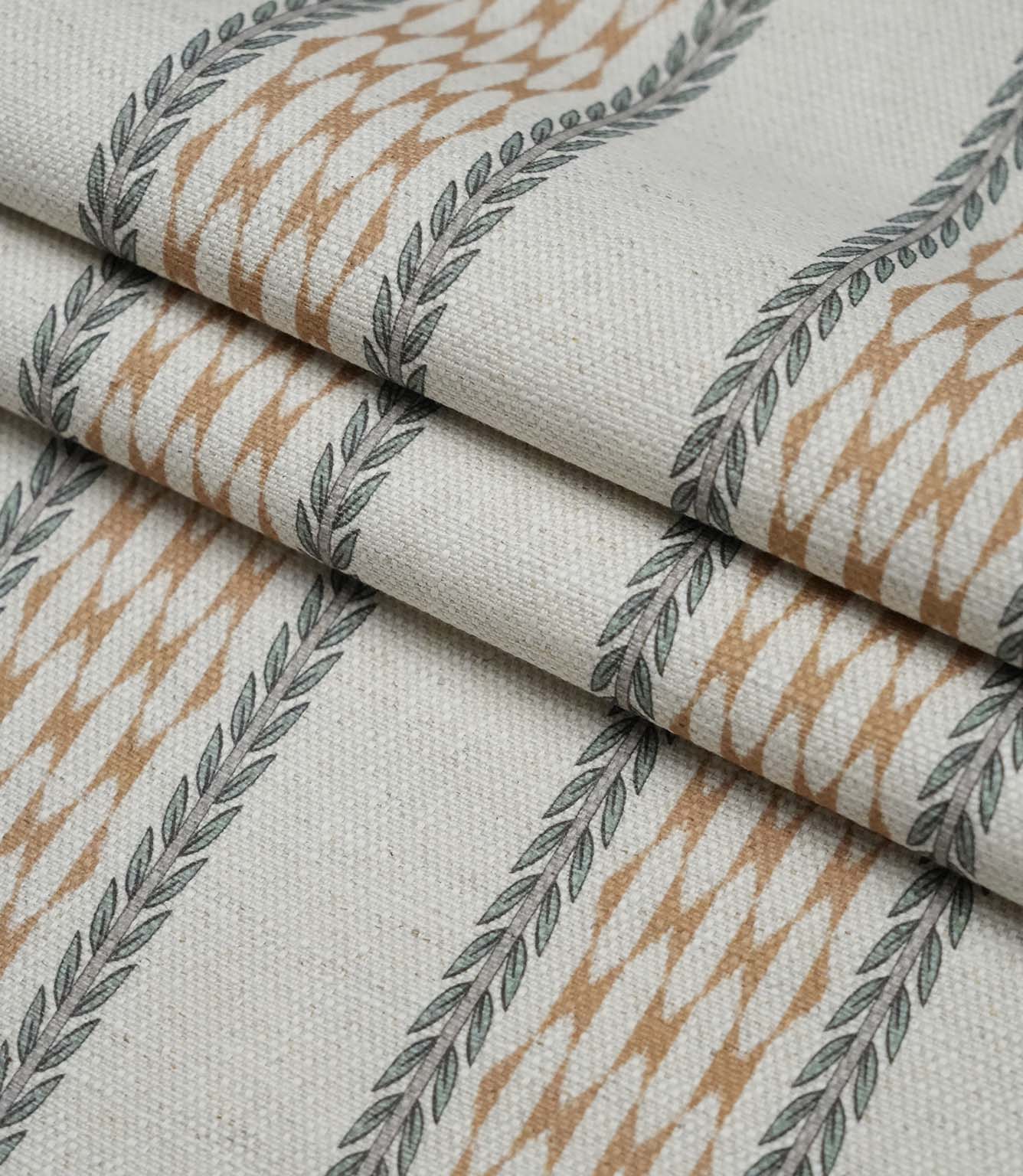 Folded Varese Rust extra wide fabric showing its woven finish and contemporary foliage stripe design.