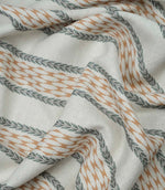 Draped Varese Rust fabric demonstrating the natural handle, ideal for curtains, blinds and cushions.
