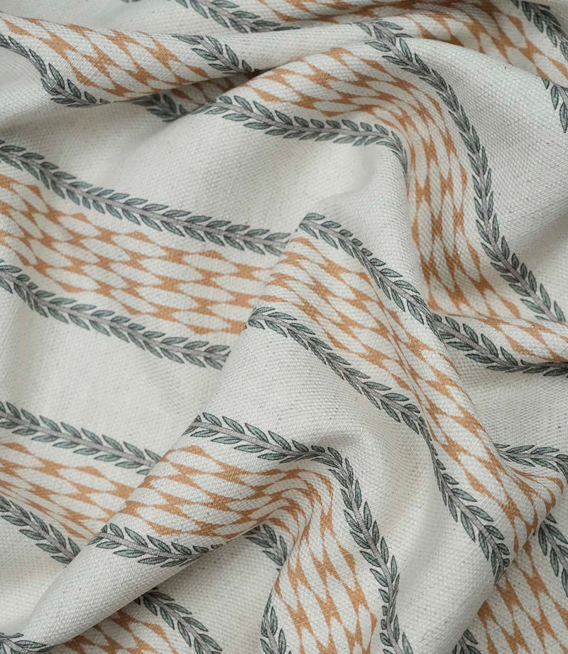 Draped Varese Rust fabric demonstrating the natural handle, ideal for curtains, blinds and cushions.