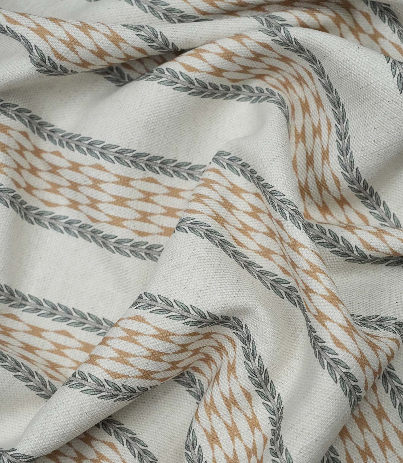 Draped Varese Rust fabric demonstrating the natural handle, ideal for curtains, blinds and cushions.