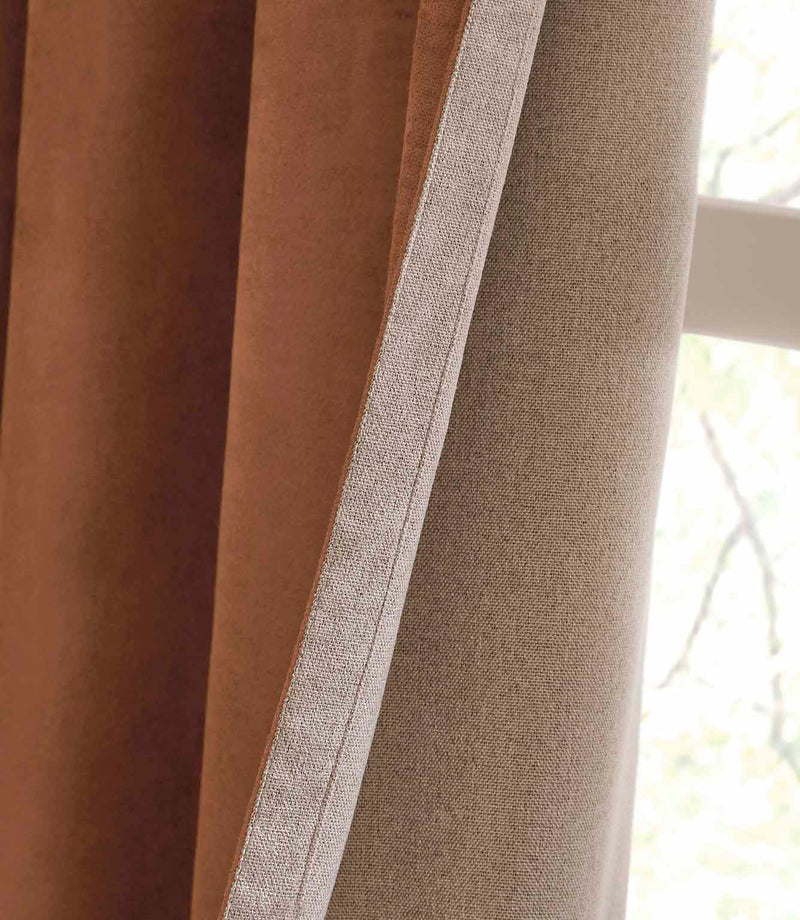 Verso Reversible Suede-look Blackout Eyelet Curtains Cinnamon | Just Fabrics