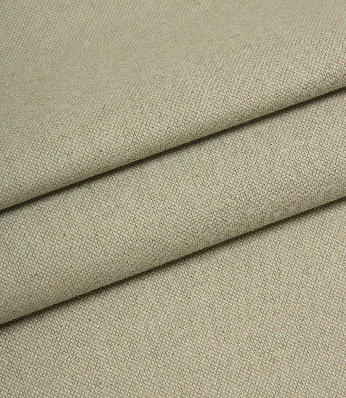 Close-up of beige fabric with a subtle texture