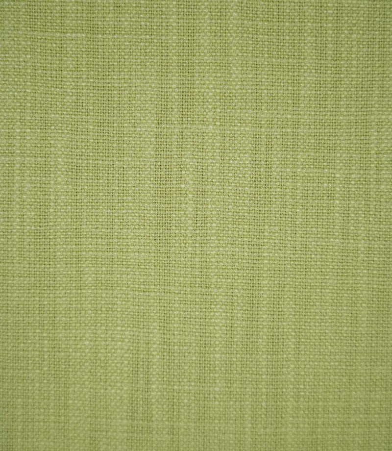 Close-up of Waverley Celery fabric in a soft green shade, showing its fine woven texture and subtle variations in the threads.
