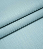 Waverley Duck Egg plain cotton fabric arranged in overlapping folds, showcasing its soft brushed finish, fine woven structure and delicate duck egg blue colouring.