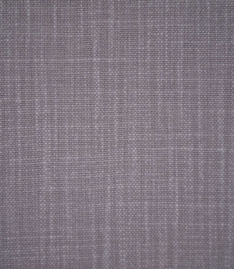 Waverley Heather 100% brushed cotton fabric in a muted mauve-purple shade, showing its closely woven texture and subtle variations in the fibres.