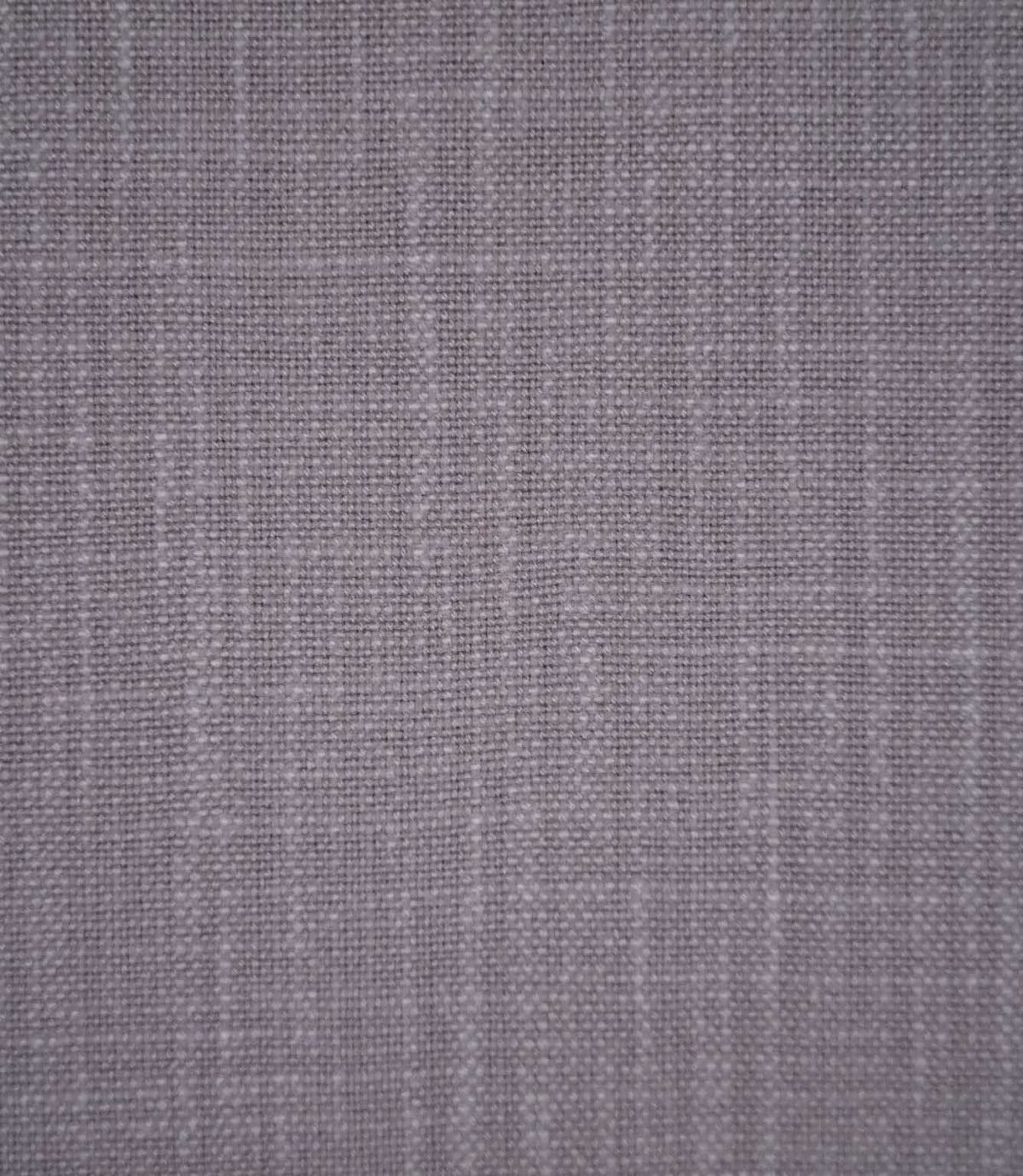 Waverley Heather 100% brushed cotton fabric in a muted mauve-purple shade, showing its closely woven texture and subtle variations in the fibres.