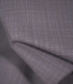 Detailed close-up of Waverley Heather brushed cotton fabric draped into a curved fold, revealing its closely woven texture and muted heather-purple appearance.