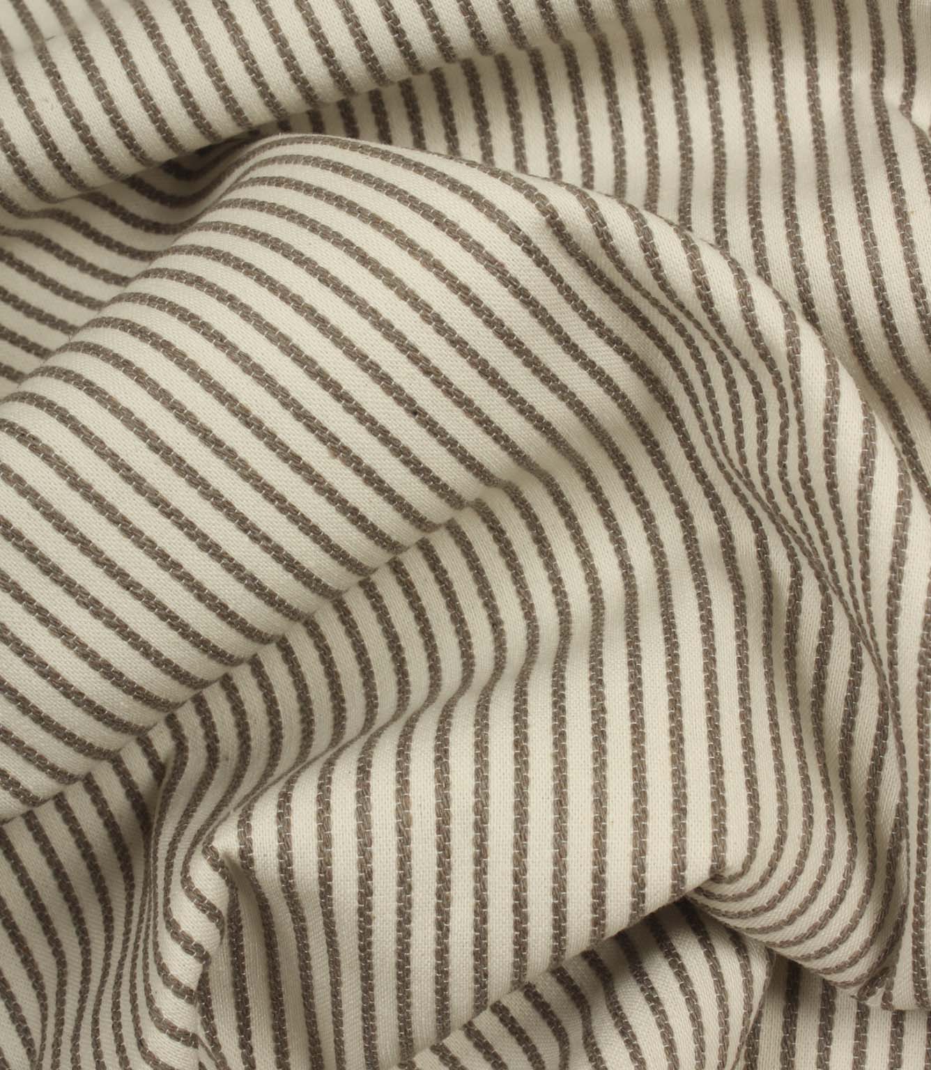 Draped Wedmore Wide ivory striped fabric with flowing folds, emphasising the textured woven surface and fine stripe pattern.