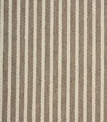 Close-up of Wedmore Wide extra wide upholstery fabric showing detailed woven stripes and textured embroidered finish.